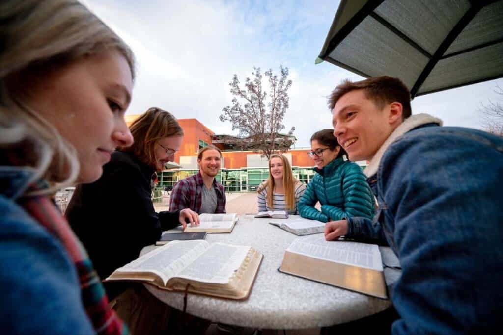 Students gathered together to talk and discuss the Bible at a student-led Bible study